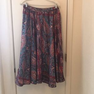 100% polyester skirt. Very full, lovely drape.